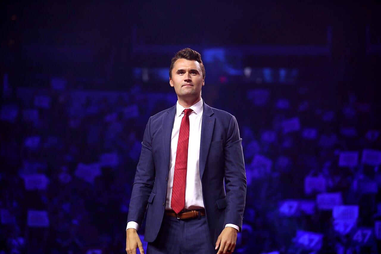 Charlie Kirk speaking at a rally for a Charlie Kirk quotes fact check context guide