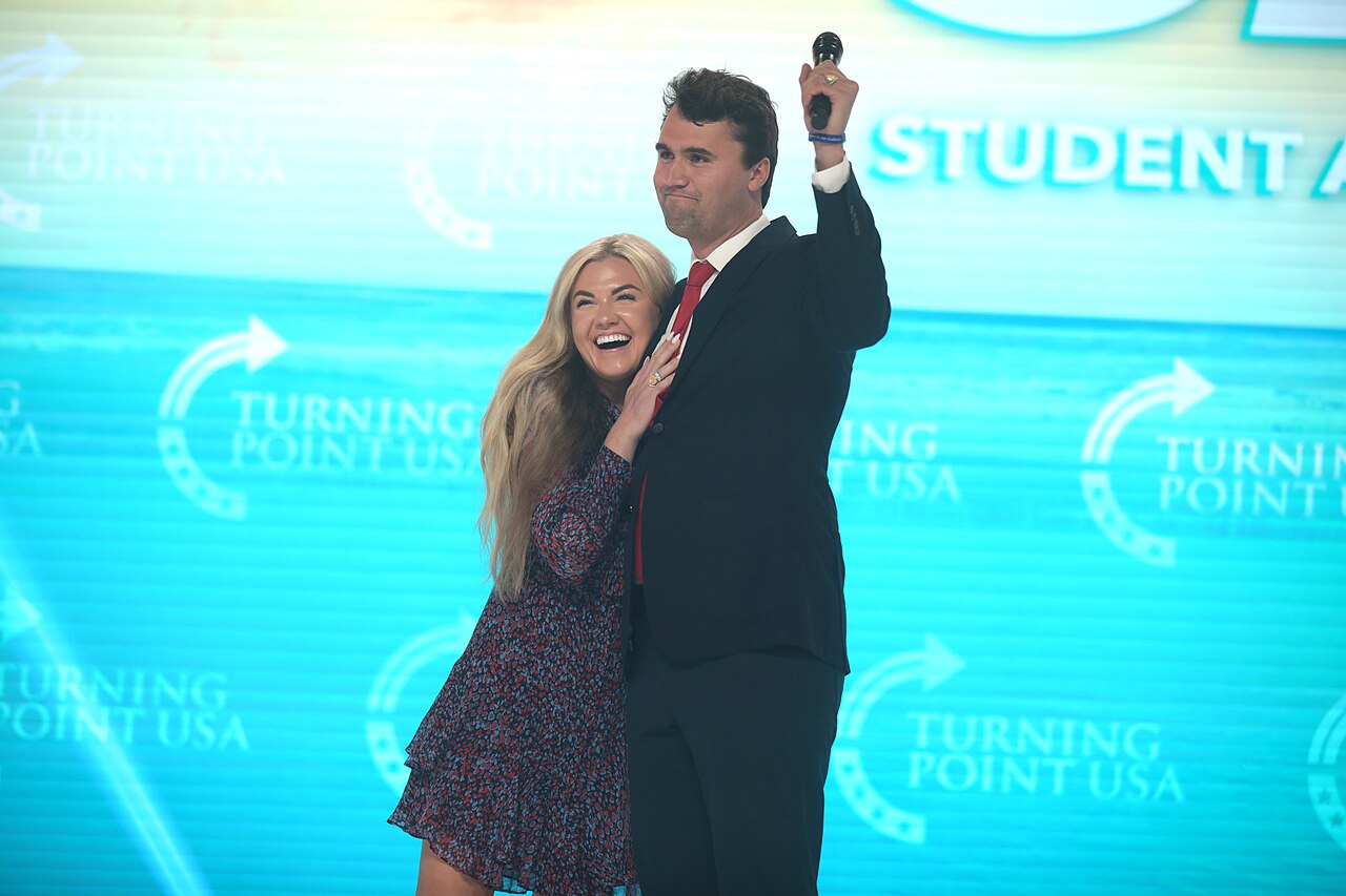 Charlie Kirk speaking at a student event for Charlie and Erika Kirk relationship timeline context